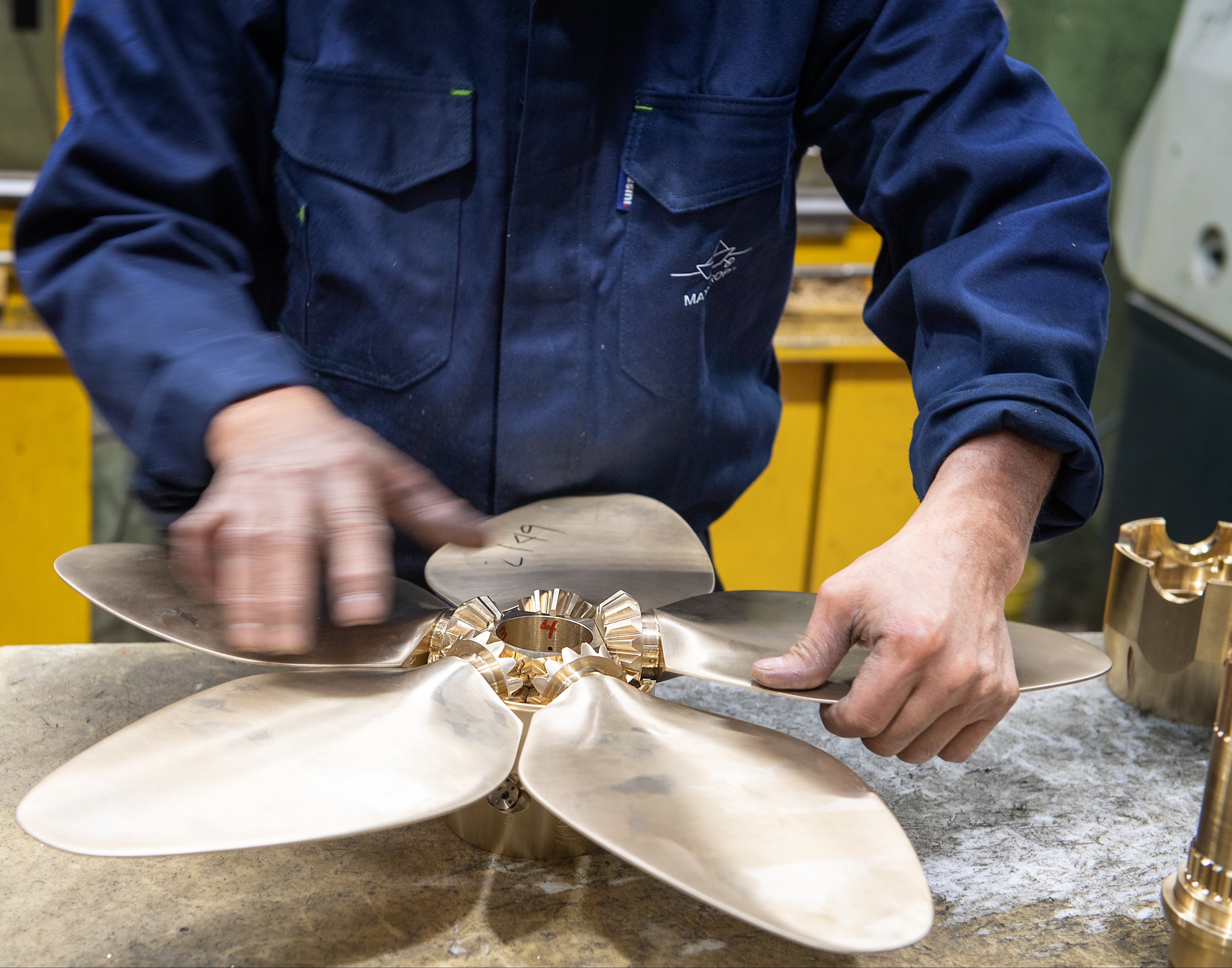 max prop - image of hands on a propeller