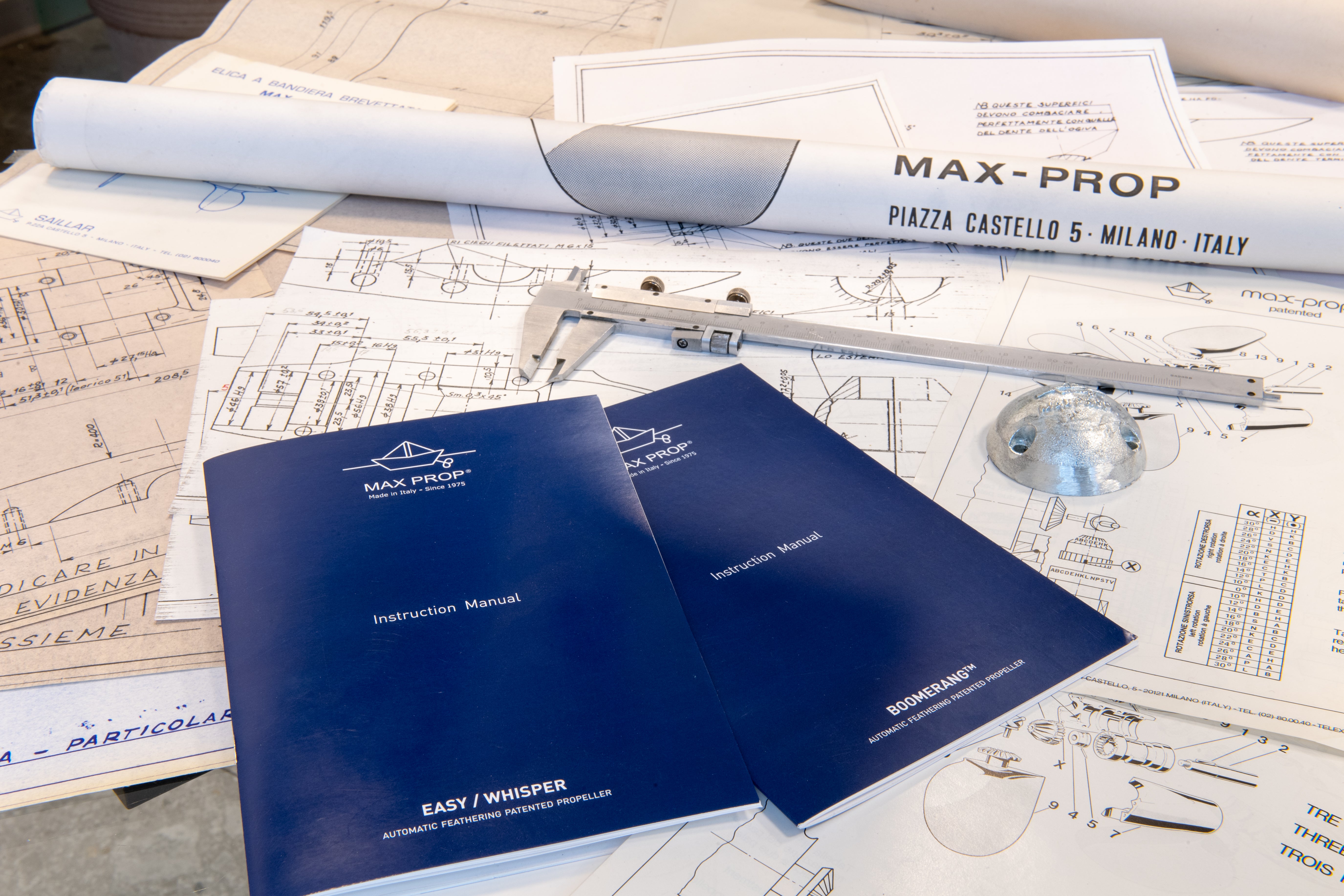 max prop - image of blueprints and instruction manual on a desk